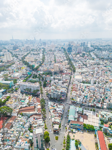 Aerial view of Ho Chi Minh City skyline and skyscrapers in center of heart business at Ho Chi Minh City downtown. Cityscape and many buildings  local houses