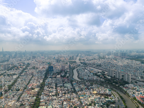 Aerial view of Ho Chi Minh City skyline and skyscrapers in center of heart business at Ho Chi Minh City downtown. Cityscape and many buildings, local houses