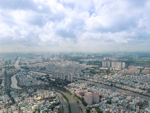 Aerial view of Ho Chi Minh City skyline and skyscrapers in center of heart business at Ho Chi Minh City downtown. Cityscape and many buildings, local houses © CravenA