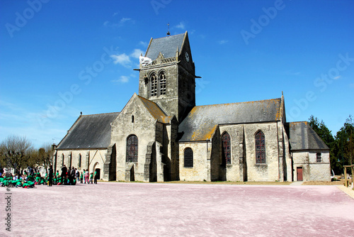 SAINTE-MERE-EGLISE, FRANCE. Parachutist hanging from church, St. Mere Eglise, in Normandy. 