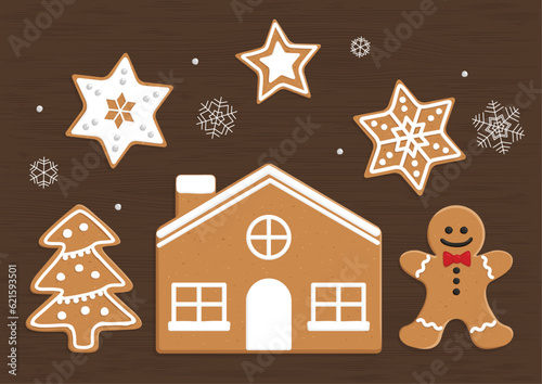 Top view vector illustration of gingerbread cookie house, star, snowflakes, christmas tree (ID: 621593501)