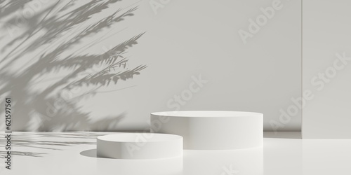 Fotografia Two empty, blank, round podium or dais in pastel brown room background with tree