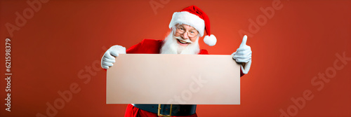 Santa Claus with a blank sign in his hands. AI Generative © StockPhotoAstur