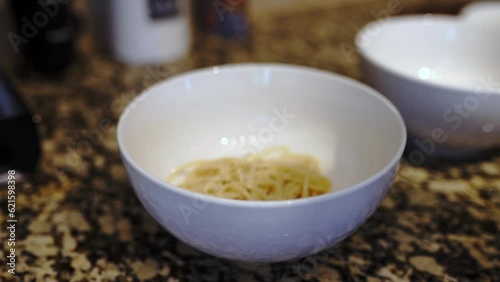 pasta with mushrooms in a creamy sauce in a plate. Cooking pasta