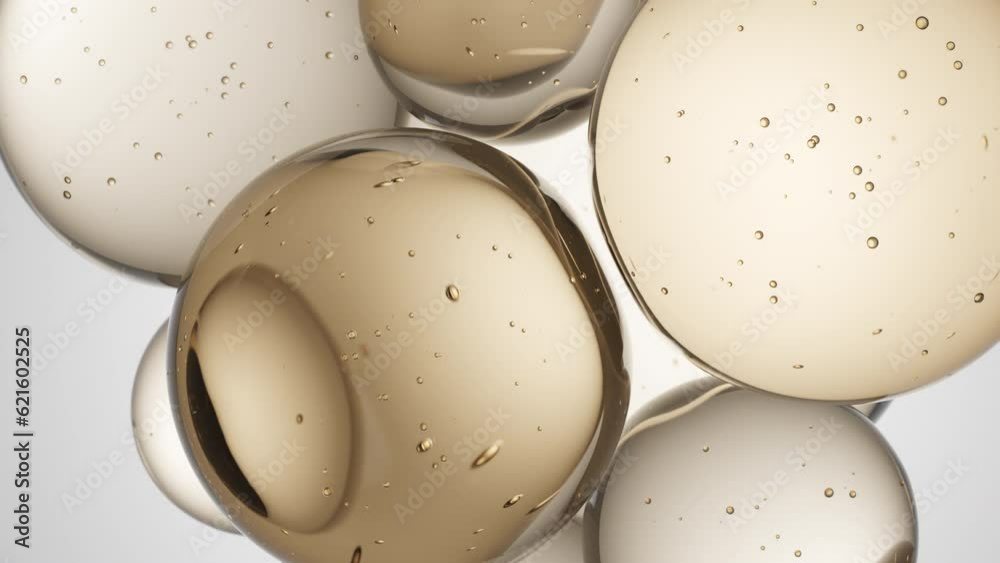 Cosmetics golden serum liquid bubbles abstract background. Cosmetic moisturizer essence gel. Collagen fluid bubble molecule. Moisturizing cream or oil for personal health care and beauty skin concept
