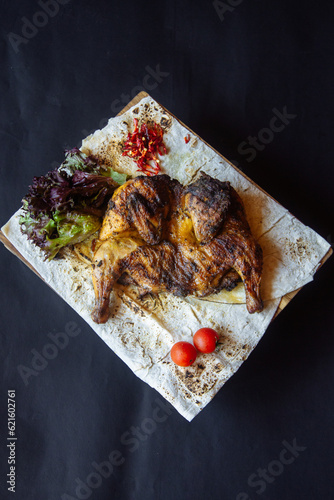 delicious meat dish chicken tapaca photo