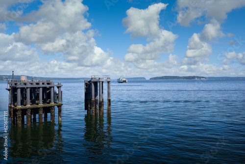 2023-06-03 MUKILITO FERRY DOCK WITH A FERRY IN THE DISTANCE ON PUGET SOUND AND WHIDBEY ISLAND IN THE BACKGROUND