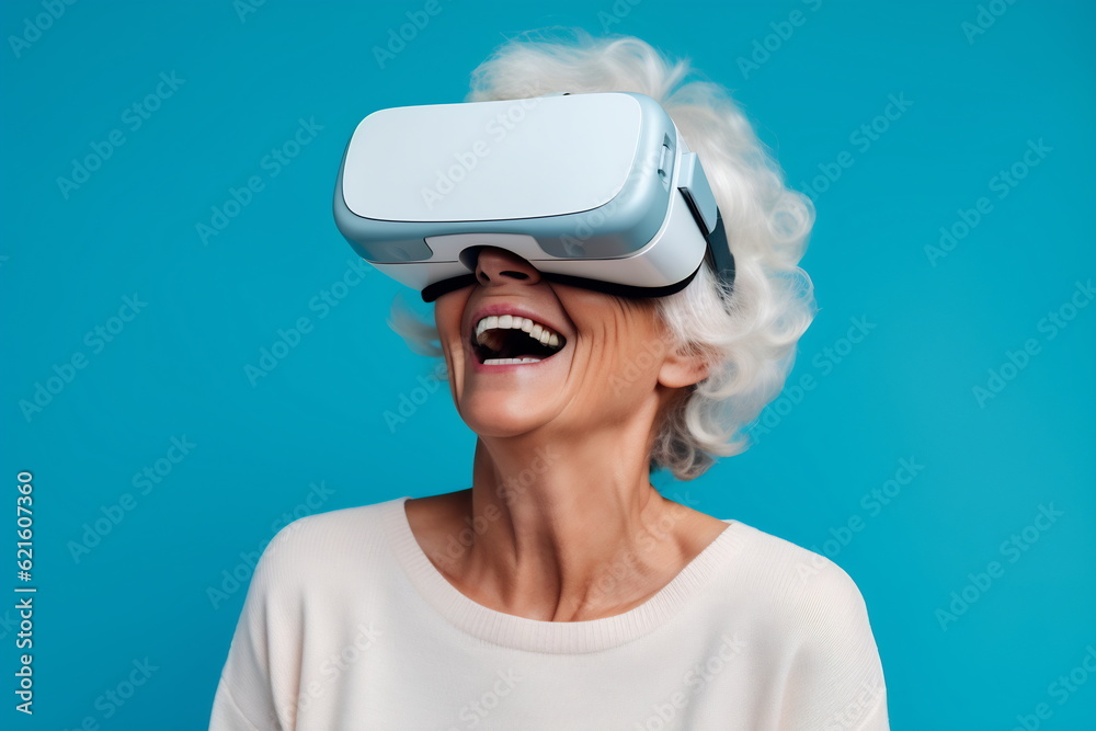 Senior woman having fun with virtual reality glasses. Old people using new headset goggles trends technology