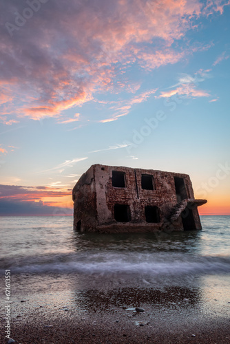 Fototapeta Naklejka Na Ścianę i Meble -  Beautiful and colorful sunset over the Northern forts in the Baltic sea coastline at Karosta (Liepaja, Latvia)