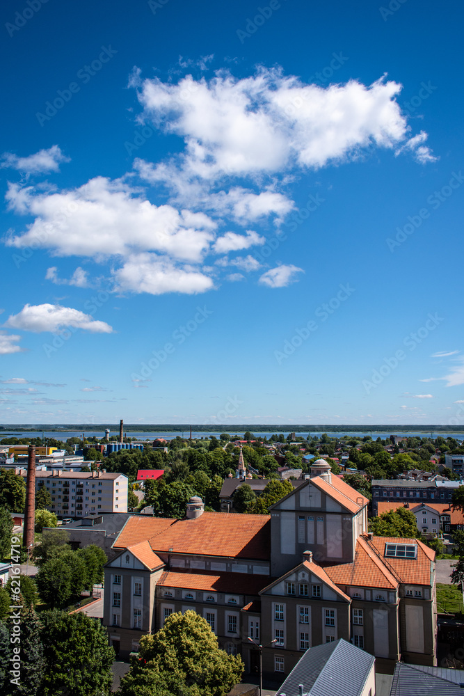 Liepaja, Latvia - June 29, 2023: aerial view of the city centre of the Liepaja city with historical buildings and traffic in the city