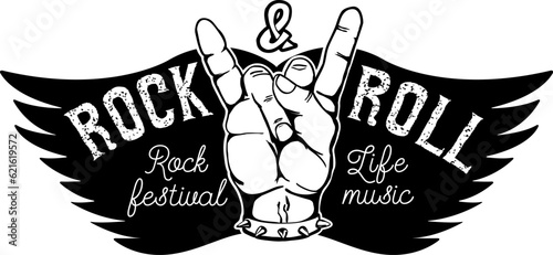Rock festival. Human hand with rock and roll sign on background with wings.  Design element for t-shirt print, poster. Vector illustration.