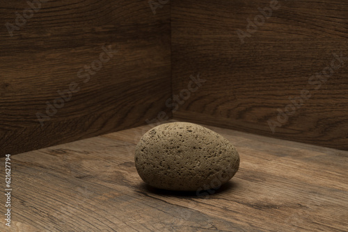 brown stone on wooden surface for podium background