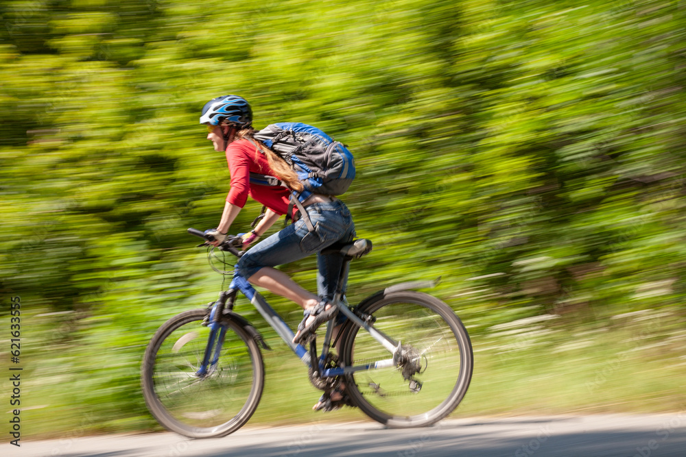 Fototapeta premium young girl on bicycle