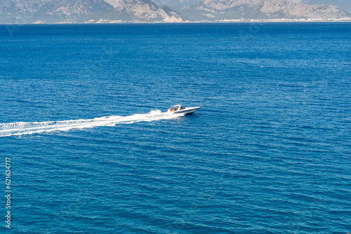 Tourism center Antalya province, Mediterranean gulf, cliffs, konyaaltı beach. Taurus mountains in the background