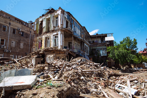 Ruined residential building. Consequences of war, explosion, earthquake or other disaster concept