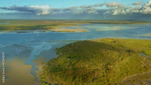 Great Sandy Strait in Australia separates mainland Queensland from Fraser Island, from Hervey Bay to Inskip Point, tourism and commercial fishing, boating Bay to Bay yacht race, islands in the strait. photo