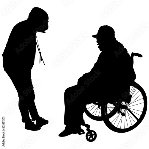 silhouette of a person in a wheelchair speaking with medical provider