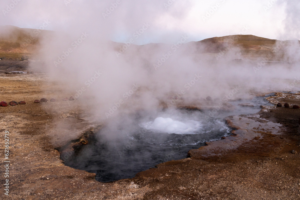 Exploring the fascinating geothermic fields of El Tatio with its steaming geysers and hot pools high up in the Atacama desert in Chile, South America
