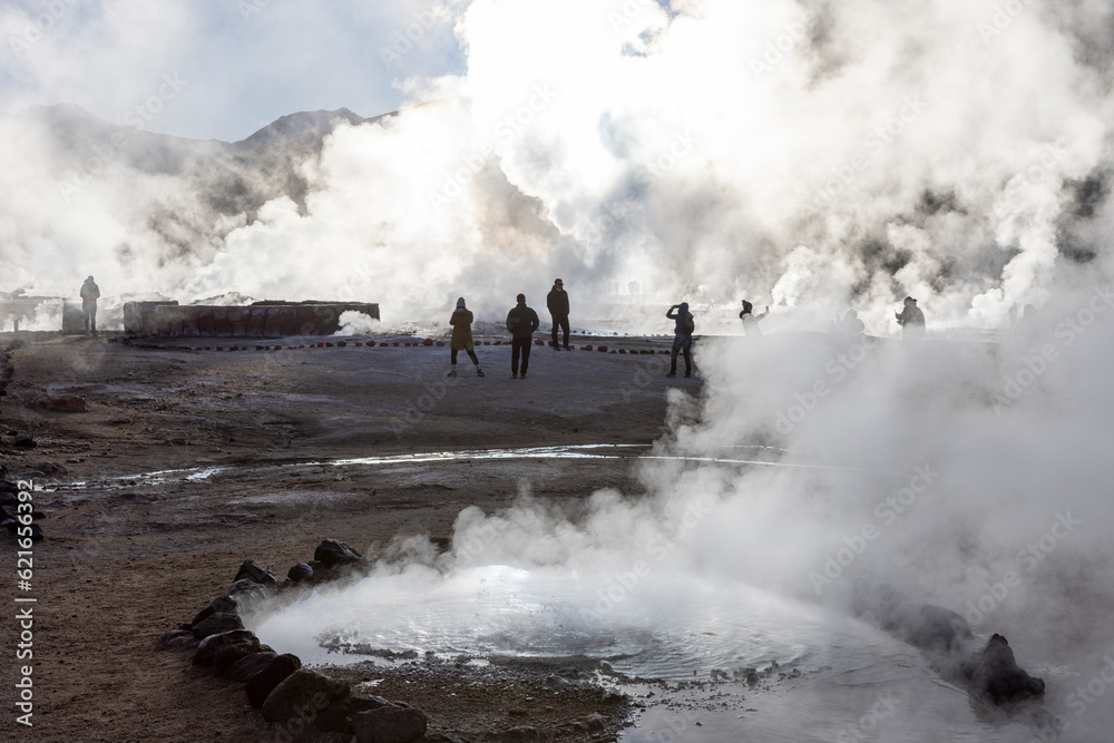 Fototapeta premium Exploring the fascinating geothermic fields of El Tatio with its steaming geysers and hot pools high up in the Atacama desert in Chile, South America
