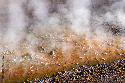 Exploring the fascinating geothermic fields of El Tatio with its steaming geysers and hot pools high up in the Atacama desert in Chile, South America © freedom_wanted