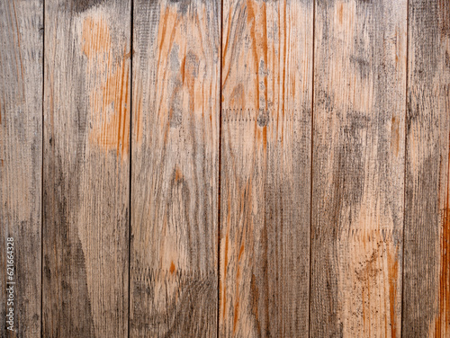Old wooden weathered parallel vertical planks as background