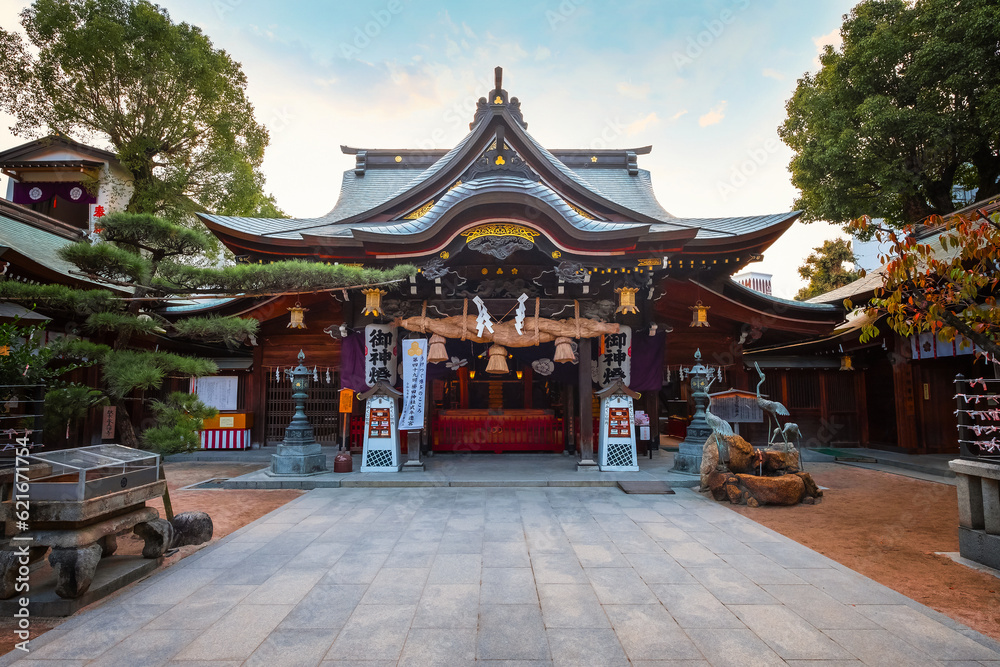 Fototapeta premium Fukuoka, Japan - Nov 20 2022: Kushida shrine in Hakata ward, founded in 757, the shrine dedicated to Amaterasu the goddess of the sun and Susanoo god of seas and storms, thunder and lightning