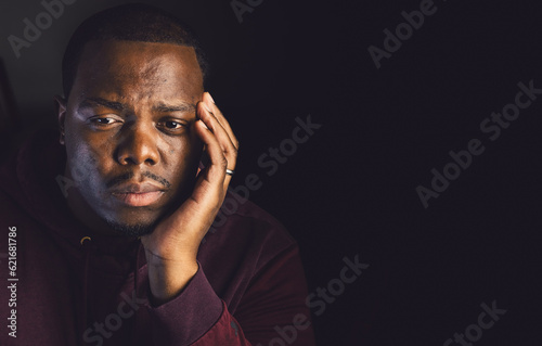 фотографія Young african american man looking sad and depressed