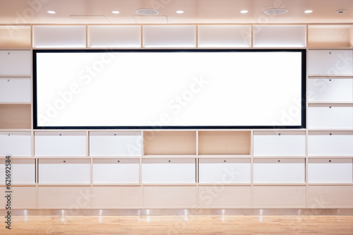 Blank white screen on shelf in modern office. Mock up