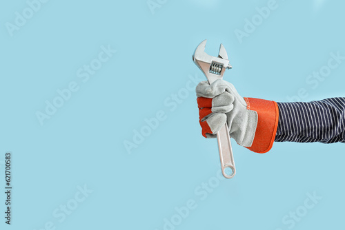 Hand in work glove holding ...