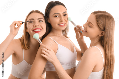 Young women with makeup bru...