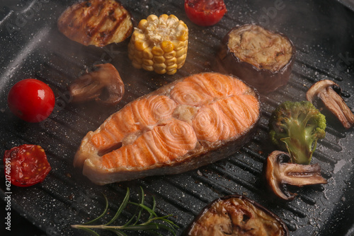 Grilled salmon steak with a...