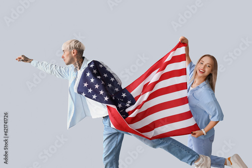 Young couple with USA flag ...