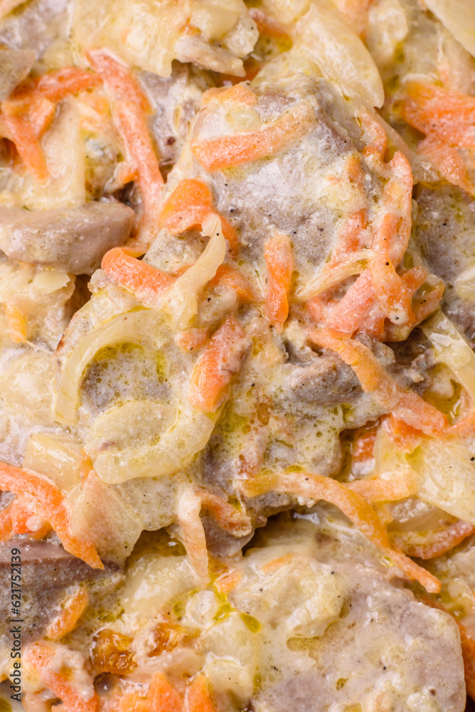 Delicious boiled beef or pork tongue sliced with carrots, onions, sour cream and spices Delicious boiled beef or pork tongue sliced with carrots, onions, sour cream and spices