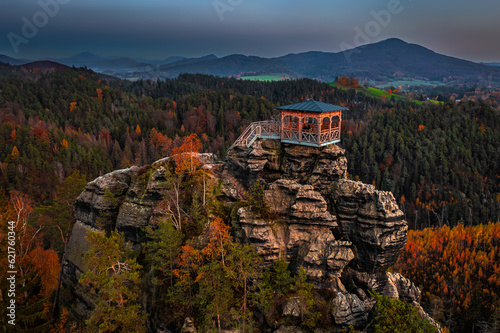 Jetrichovice, Czech Republic - Aerial view of Mariina Vyhlidka (Mary's view) lookout with a beautiful Czech autumn landscape and blue sunset sky in Bohemian Switzerland region photo