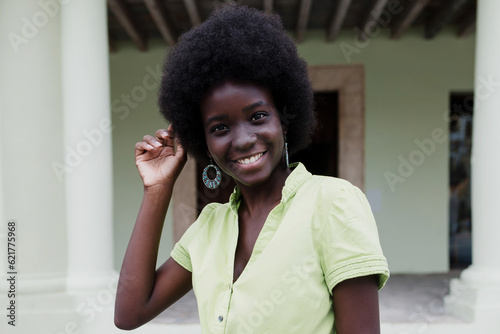 portrait of African American woman with afro hair, young caribbean girl in Latin America © Marcos
