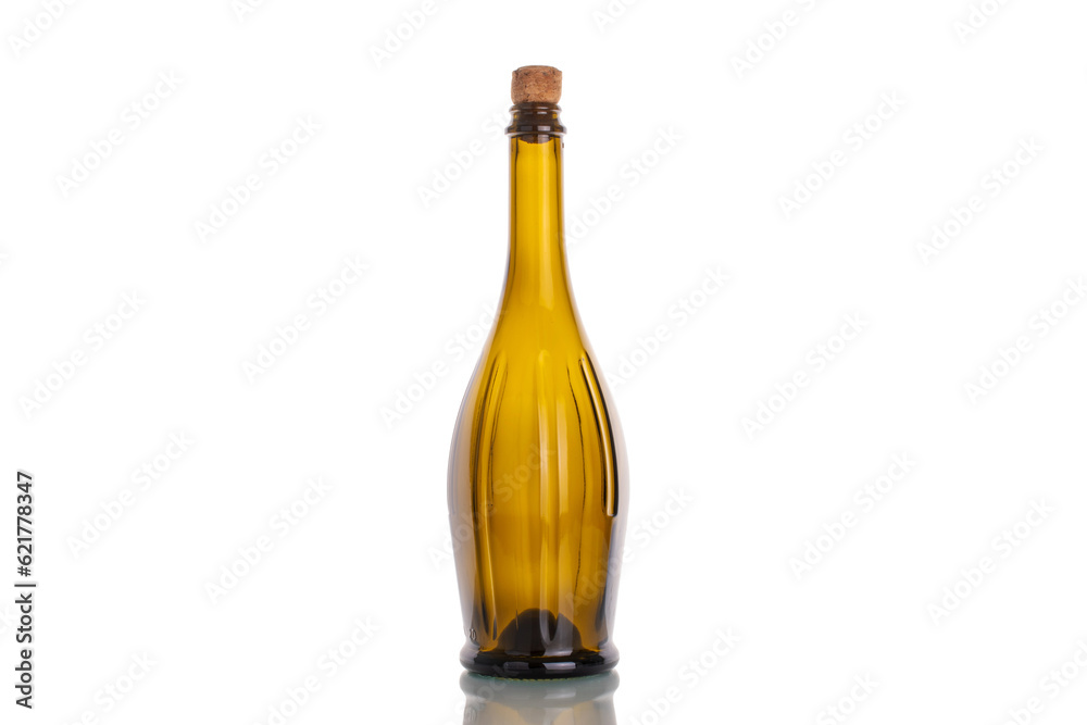 One empty glass bottle with cork, macro, isolated on white background. One empty glass bottle with cork, macro, isolated on white background.