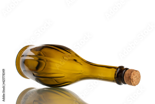 One empty glass bottle with cork, macro, isolated on white background.