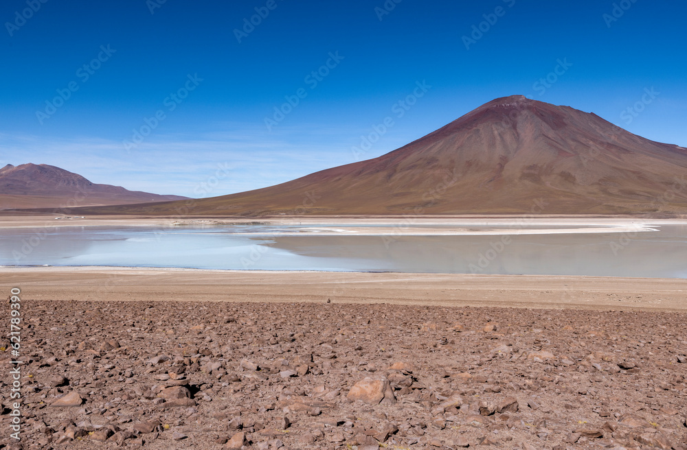 Picturesque Laguna Verde, just one natural sight while traveling the scenic lagoon route through the Bolivian Altiplano in South America 