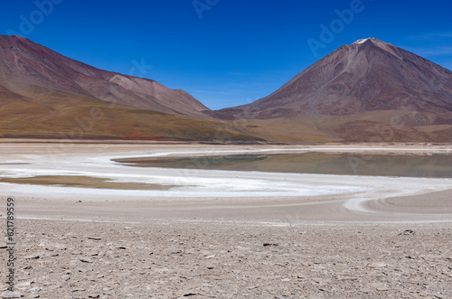Picturesque Laguna Verde with Licancabur Volcano, just one natural sight while traveling the scenic lagoon route through the Bolivian Altiplano