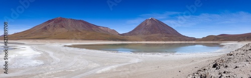 Picturesque Laguna Verde with Licancabur Volcano  just one natural sight while traveling the scenic lagoon route through the Bolivian Altiplano - Panorama