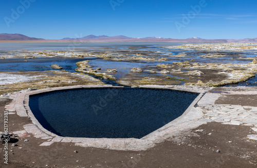 Termas de Polques, pool with a hot spring at Laguna Chalviri, just one highlight while traveling the scenic lagoon route in the Bolivian Altiplano photo