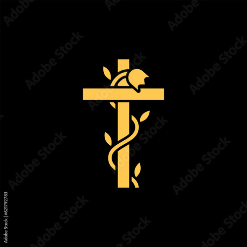 The golden cross is decorated with a metal climbing plant with a flower.