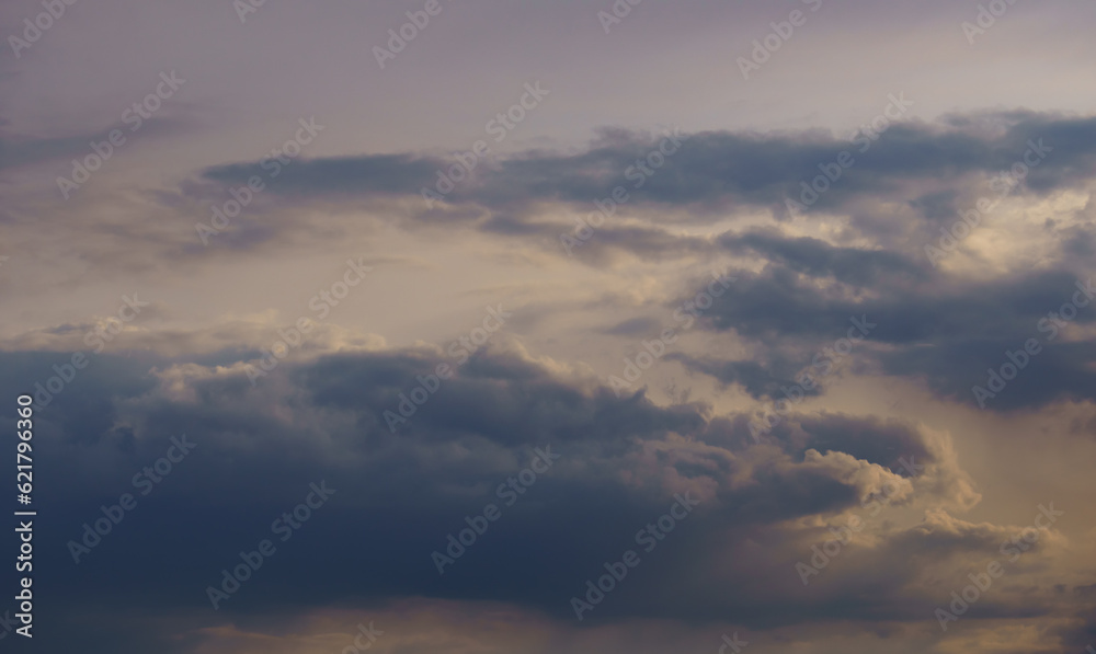 beautiful sunset sky with cumulus clouds for abstract background
