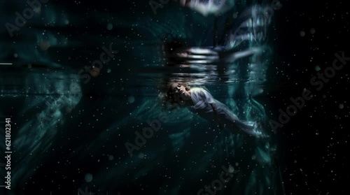 Submerged Fear: Struggle Against the Deep - Chilling image of a girl, her head just beneath the water's surface, in a distressing moment of sinking. Reworked Generative AI using Suki's face 