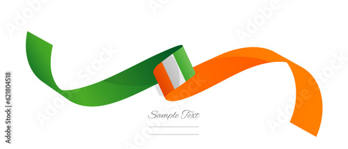 Côte d'Ivoire flag ribbon vector illustration. Ivory Coast flag ribbon on abstract isolated on white color background photo