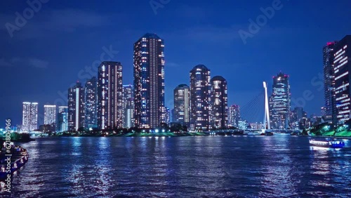 Night light Tokyo, Tsukuda, Toyosu skyscrapers and bridge The Sumida River Yakatabune, pleasure boat photo