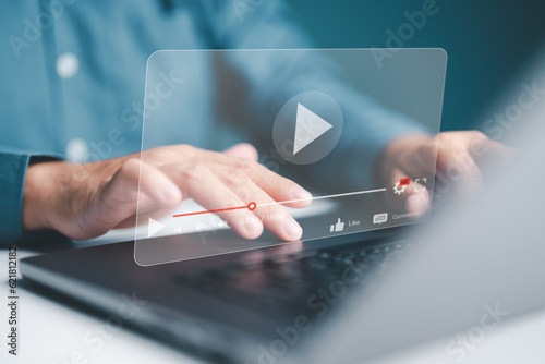 Businessman hands use laptop to watch online video streaming, live content, or movie for relaxing time. Study lessons, Online learning for self-improvement for new career opportunities. Skill upgrade.