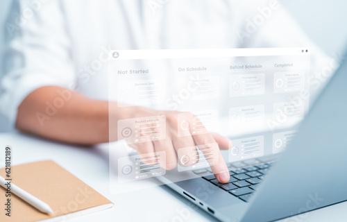 Office man uses computer laptop to make a plan with software. Project management for tasks or responsible methodology boards on screen. Process, workflow, task list, due date setting application tool.
