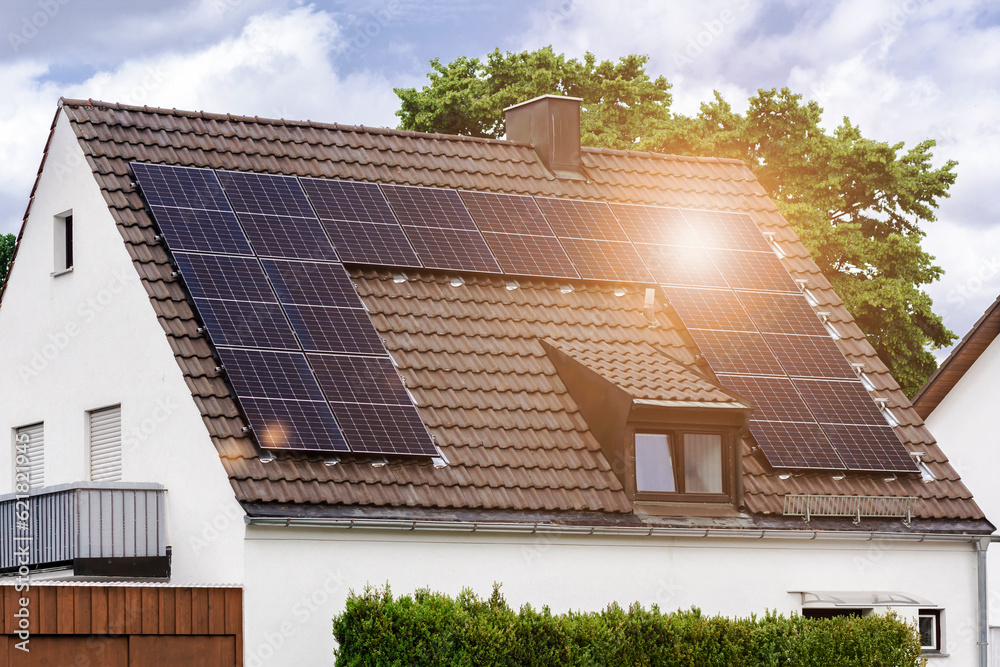 Picture of Solar Panel Roof House. Old Scandinavian Residential House with Brown ...