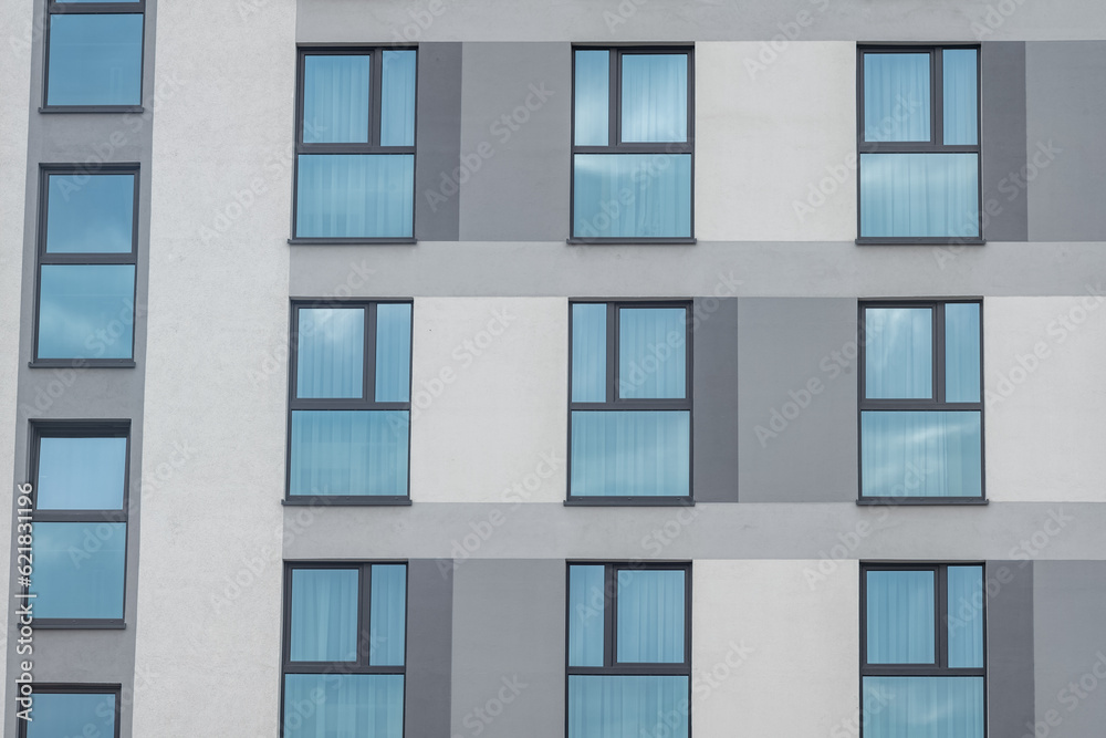 facade of a building with many windows facade of a building with many windows